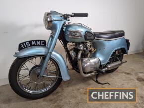 1957 TRIUMPH Twenty One 350cc MOTORCYCLE Reg. No. 115 MME Frame No.H872 Engine No. 21H872 The Twenty One was the first unit construction Triumph twin. The full 'bath tub' body work did not prove overly popular at the time, especially in the USA, where 