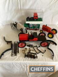 Tinplate fire engine, requiring assembly, chocolate tin in form of vintage van together with two damaged tractor models and boxed Mercedes tractor unit (5)