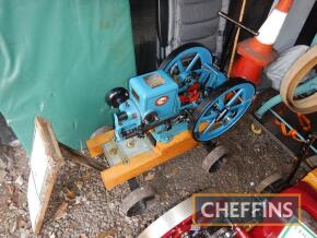 1915 Little Jumbo Model N 1.75bhp single cylinder, horizontal, open crank water cooled stationary engine with twin flywheels, hit and miss magneto, mounted to wooden trolley Serial No. 16018