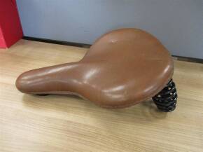 Vintage motorcycle seat in restored condition