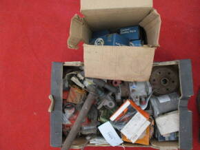 Box of miscellaneous classic car parts