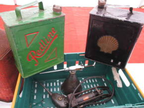 Two 2 gallon petrol cans, a Redex can, a footpump and an oil can