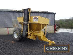 Farm made single axle gravel cart with hydraulic driven side discharge elevator on Alliance 23.1-26 wheels and tyres.