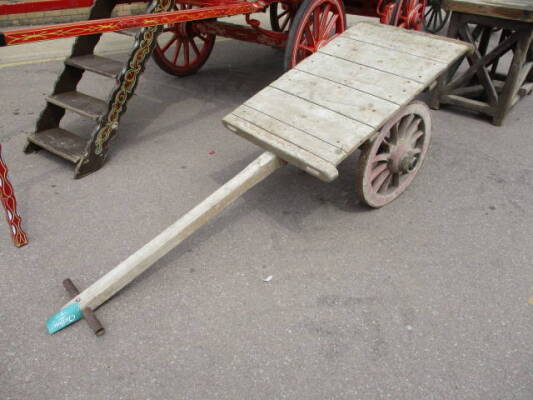 Hand drawn platform cart of wooden construction