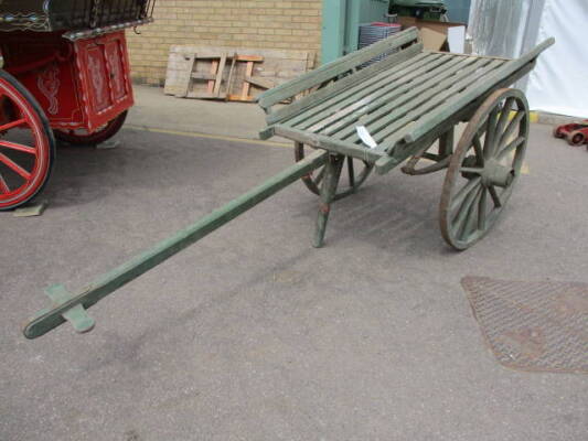 Hand drawn coffin cart with eliptical leaf springs
