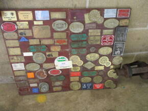 Various rally plaques, board mounted