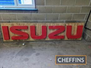 Illuminated Isuzu sign, mounted on timber, wired with UK 3-pin plug, 106x24ins