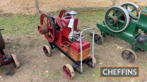 1914 Amanco 'Hired Man' 2.25hp 4ins bore, 5ins stroke single cylinder horizontal open crank stationary engine with twin flywheels, hit and miss magneto on wooden trolley Serial No. 130649