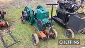 1920 Powell 3hp 4ins bore, 6ins stroke single cylinder open crank horizontal stationary engine with twin flywheels and belt pulley on wooden trolley. Reported to have cost £14 when new Serial No. 20355