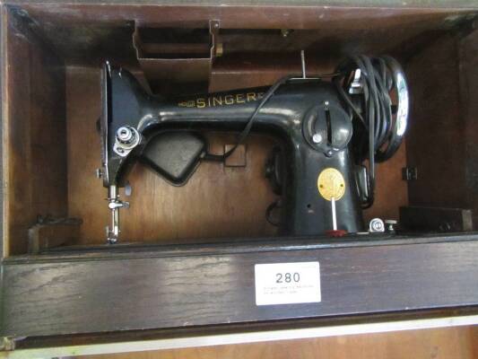 Singer sewing machine in wooden case