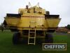 1992 NEW HOLLAND TF46 COMBINE HARVESTER. With Mercedes V8 Engine. On 30.5R32 front and 500/60-22.5 rear wheels and tyres. Fitted with 24ft self-levelling header on Mekang single axle header trailer. Reg. No. K342 NPO Serial No. 7413028 Hours: 4846 FDR: - 7