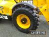 2023 JCB 560-80 AgriXtra DualTech VT 4wd 4fws TELESCOPIC LOADER. Fitted with Qft headstock and pallet tines, rear pickup hitch and 1no. spool service. On Michelin Bibload 480/80R26 rear Michelin Bibload 480/80R26 front wheels and tyres. On farm from new. - 16