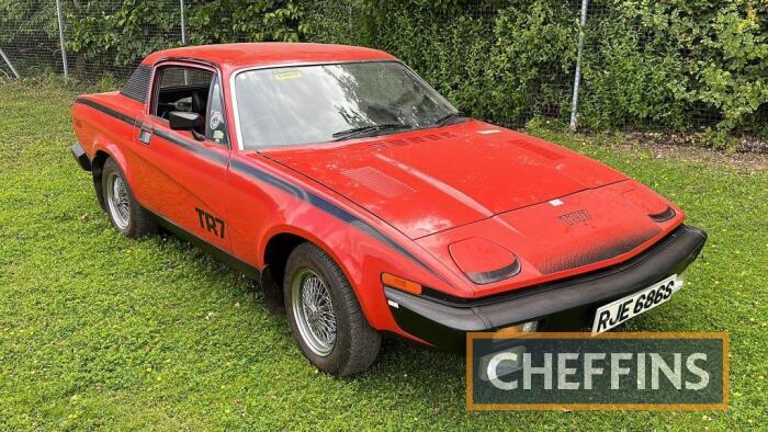 1977 TRIUMPH TR7 1998cc petrol CAR Reg. No. RJE 686S Chassis No. ACG18719 Miles: 18,833 MOT: Exempt (Last expired 22nd July 2012) Finished in Flamenco red with TR7 decals and red tartan seat upholstry. This TR7 coupe appears to have been owned by the vend