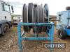 2010 Jones 1000M/5inch mounted 5section lay flat hose reel fitted with c.897m layflat hose with Bauer Male and female connectors. Serial No. JELHR030 - 2