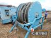 2010 Jones 1000M/5inch mounted 5section lay flat hose reel fitted with c.897m layflat hose with Bauer Male and female connectors. Serial No. JELHR030 - 5