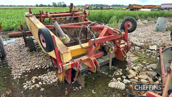 Jones mounted windrower with side elevator spares