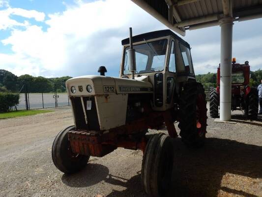 1977 DAVID BROWN 1212 4 cylinder diesel TRACTOR Reg. No. XVY 623R Serial No. 11154601 Fitted with a full set of weights, original toplink and an assistor ram, supplied with V5C documentation