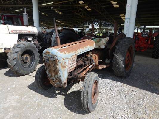 1957 MASSEY FERGUSON FE35 4cylinder diesel TRACTOR Reg. No. FEC 432 (expired) On 12.4x28 rear and 6.00x16 front wheels and tyres. Described as a barn find tractor with no battery fitted but starts and runs with a tow!