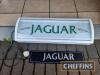 Jaguar showroom lightbox sign and advertising number plate