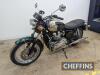 2005 TRIUMPH Bonneville T100 790cc MOTORCYCLE Reg. No. AY05 DKO Frame No. SMTTJ912TM4193695 Engine No. T194555 MOT: Expired May 2023 Finished in Goodwood Green with gold infill, this 2005 Bonnie is showing just 1,952 miles from new. The cosmetic cond - 2