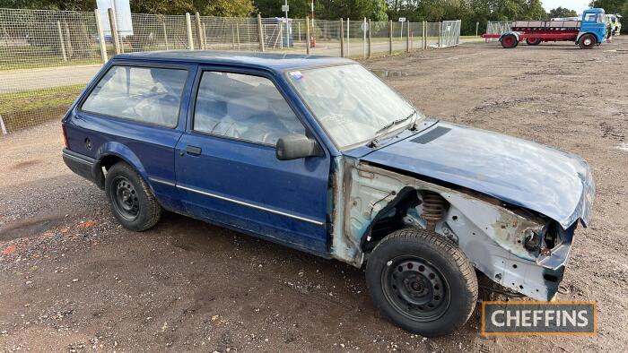 1987 FORD Escort 1.4L 1392cc estate CAR Reg. No. E317 JNV Chassis No. WF0DXXGCADHJ37119 Reportedly in the same family ownership from new, the Escort has been off the road for 10+ years after some accident damage to the front offside wing. Vendor reports t