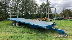 2009 Warwick 24ft tandem axle flatbed trailer with bale raves Serial No. 1090320