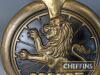 Lucas lion wall or cabinet mounted trademark logo, celluloid construction to appear as brass 13.5ins tall - 2