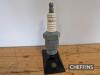 Champion, a novelty radio in form of spark plug, mounted to base c.14.5ins tall