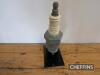 Champion, a novelty radio in form of spark plug, mounted to base c.14.5ins tall - 5