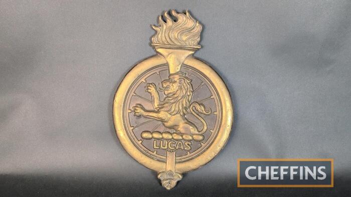 Lucas lion wall or cabinet mounted trademark logo, celluloid construction to appear as brass 13.5ins tall