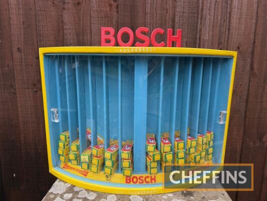 Bosch Sparkplug wall mounted display cabinet of plastic construction