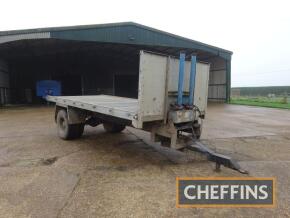 Farm made hydraulic tipping flatbed trailer with hydraulic brakes on 10.00R20 wheels and tyres