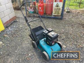 Makita pedestrian lawn scarifier. Fitted with 212cc engine