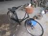 Vintage bicycle with wicker shopping basket