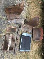 Qty Ferguson FE35 parts to inc' seat pan, radiator, footplates, nine hole drawbar etc