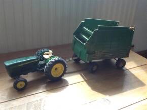 Vintage diecast John Deere tractor and forage wagon