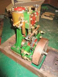 Stuart vertical steam engine driving horizontally opposed pump 7.5ins dia flywheel