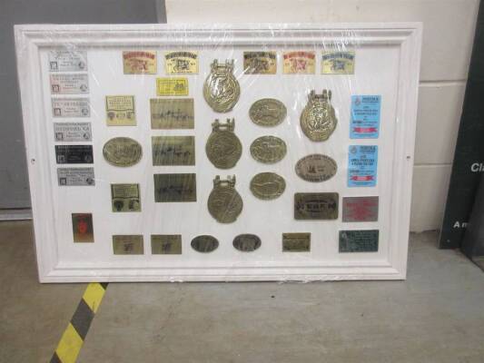 Display board of rally plaques and badges ex Jack Richards