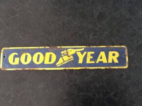 Goodyear, a small enamel sign