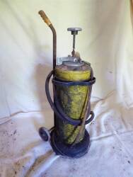 Two stroke oil dispenser