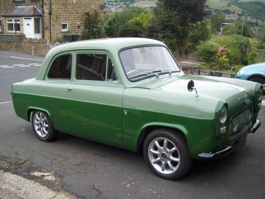 1958 1993cc Ford Anglia 100E Custom Reg. No. AJU 831A Chassis No. 621712 A discreetly customised 100E that has been fitted with a Sierra 205 Pinto engine and matching 4 speed box with twin choke carburettor. Running gear and bodywork mod's consist of new