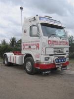 2001 Volvo FH12 Globetrotter 4x2 tractor unit Reg. No. Y58 PVV VIN: YV2A4DAA61A521331 Finished in white over red with a rack of four spotlights, stainless Eminox exhaust shield and external air horns to the cab roof. The original operating instructions ar