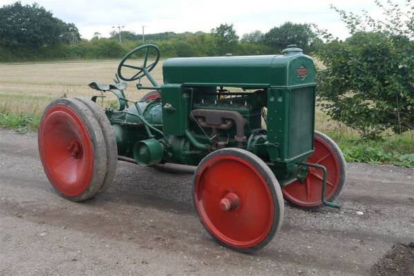 RUSHTON Industrial 4cylinder petrol TRACTOR Serial No. A515 Fitted with Industrial heavy cast M-H rims with banding, belt pulley, underslung exhaust, period repair to block. An older repainted example