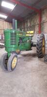 JOHN DEERE Model A 2cylinder petrol TRACTOR A rowcrop version appearing to be in good original condition with straight tinwork