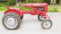 McCORMICK FARMALL Model A 4cylinder petrol/paraffin TRACTOR Fitted with rear wheel weights. An earlier refurbished example