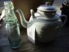 White enamel harvest teapot and lemonade cod bottle