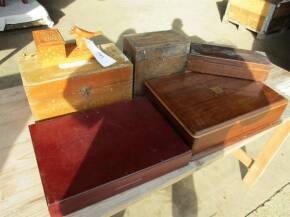 Various wooden boxes including an animated cigarette dispenser