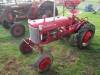 INTERNATIONAL FARMALL Cub 4cylinder petrol TRACTOR Serial No. 51211 Fitted with a single furrow plough. Stated to be in good condition. (NO LOGBOOK)
