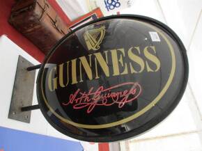 Guinness, a wall mounting illuminating sign