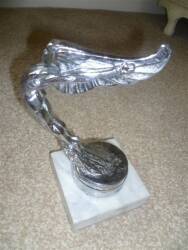 Hudson radiator cap mascot in the form of a speed god with clasped wings behind